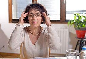 PIC - Older woman with headache